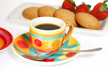 Coffee , biscuits and strawberries