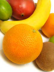 Fresh oranges, banana, mango, kiwi, limes