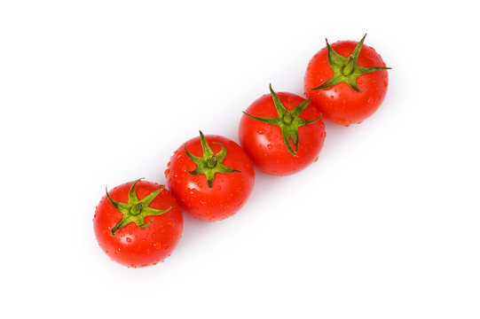 Row of tomatoes isolated on the white background