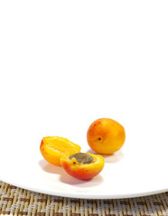 Ripe apricots and black currant