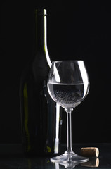 Still-life wine bottles and glass