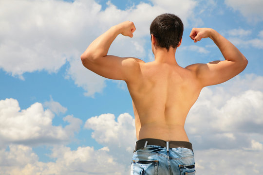 back bodybuilder on sky