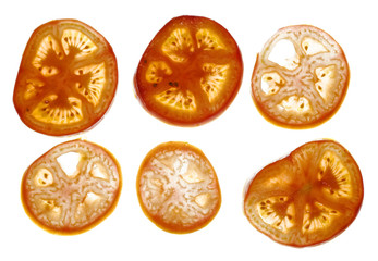 Sliced tomato isolated on white background.