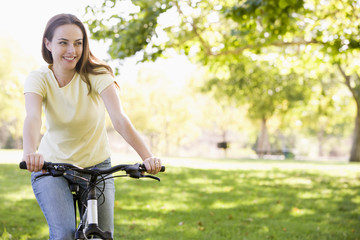 Woman on bicycle smiling