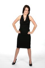 pretty teen standing strong in black dress