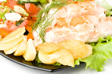 Stake from a salmon with vegetables