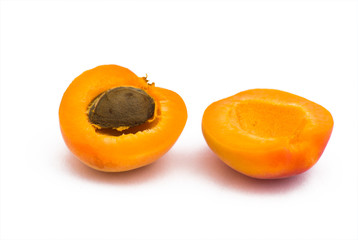 Cut apricot with pit
