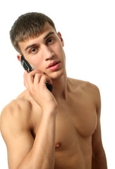 Fototapeta premium Muscular Man Calling on the Cell Phone