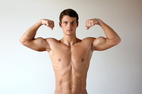 Muscular Man Flexing His Biceps