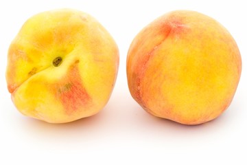 Two ripe peaches