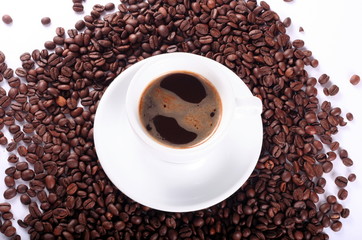 Cup and coffee beans