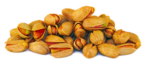 Pistachios nuts over white