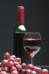 Bottle and glass of  wine,  grapes