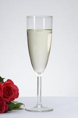 sektglas und rose