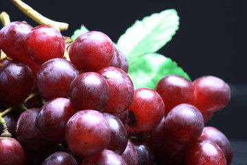 Glowing blue grapes close-up