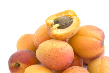 Fresh appetizing apricots on a white background