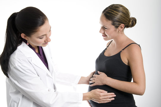 pregnant woman and her doctor