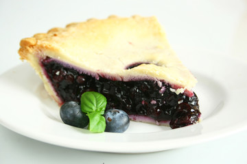 Blueberry pie on a white background