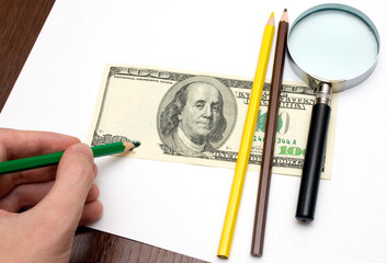 Someone draw dollar by pencils