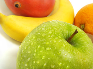 Green apple, banana, mango, orange