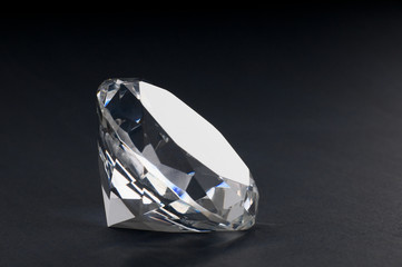 A close up of a diamond on black  background