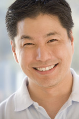 Fototapeta premium Head shot of man smiling