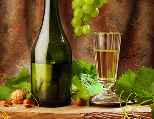 White wine with grapevine and nuts