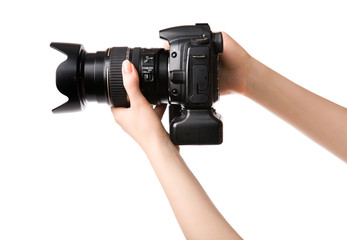 Woman hands holding professional photo camera