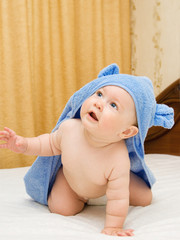 Small baby in blue towel #6