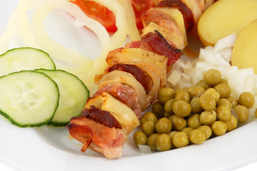 Spit with side dish