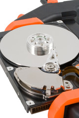 The computer hard disk clamped in a manual clamp