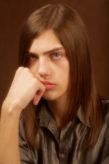 Fototapeta premium young man with long hair