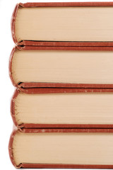 closeup of stack of old school books