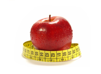 Apple and tape measure isolared