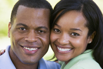 Couple outdoors smiling