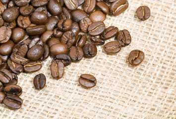 coffee beans on burlap background