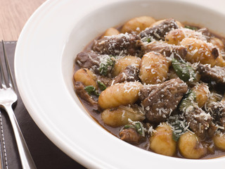 Oxtail Braised in Red Wine with Basil Gnocchi and Parmesan Chees
