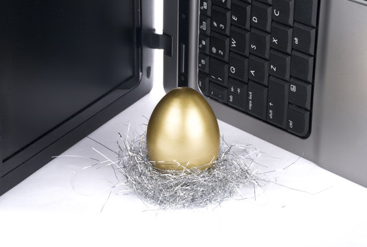 laptop and golden egg