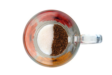instant coffee and sugar in glass cup