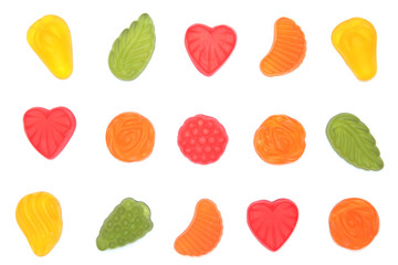 Multicolored candies isolated on white background.
