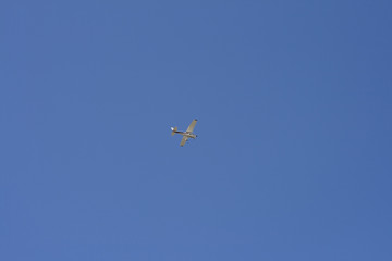 Airplane in the blue sky