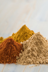 Heaps of ground spices