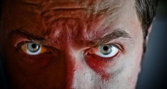 Criminal with blood on his face