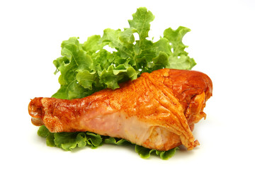 turkey leg served with green lettuce
