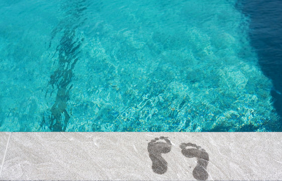 Feet By The Swimming Pool