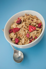 Cereal & fruits on a blue background