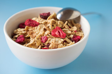 Cereal & fruits on a blue
