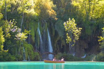 Close look at the waterfalls from a boat, lake Kozjak, Plitvice