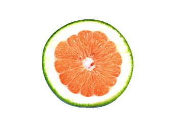 green grapefruit slice isolated on white