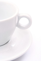 a half of white cup isolated on white background
